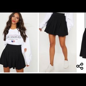 Black mini tennis pleated skirt